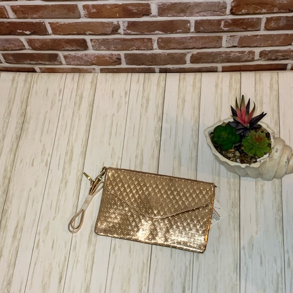 Disney Handbags - NWT Disney rose gold Mickey Mouse large clutch